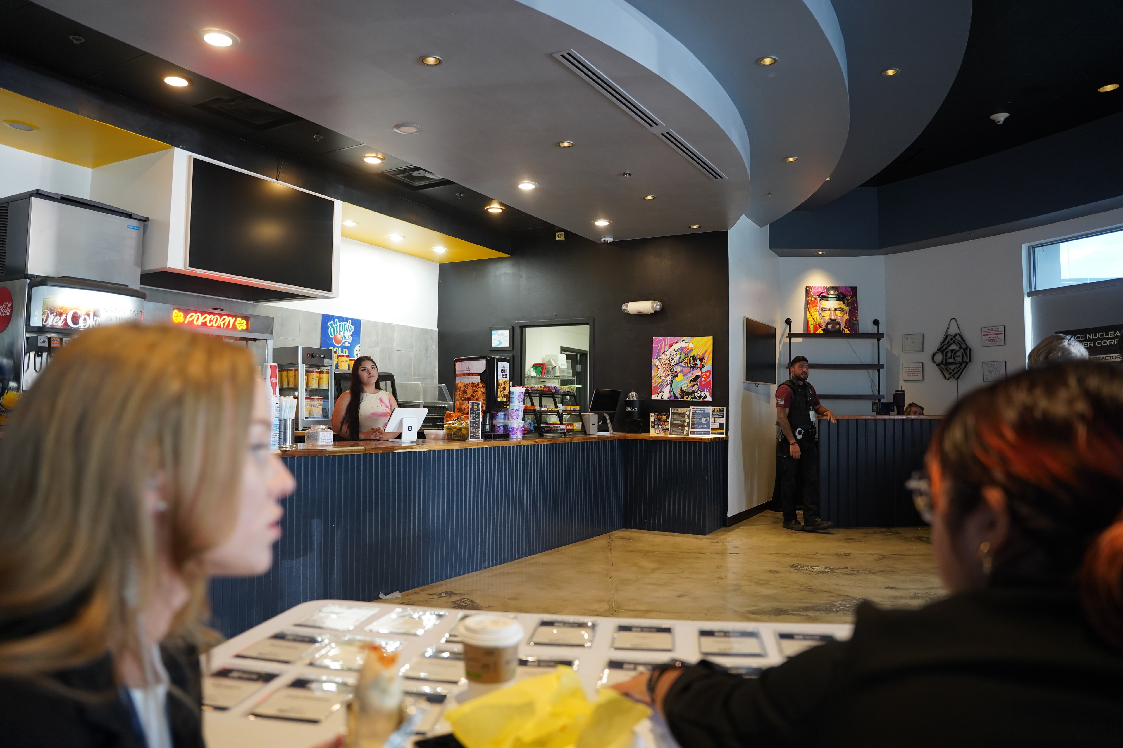 Forum attendees gathering at the venue concession area