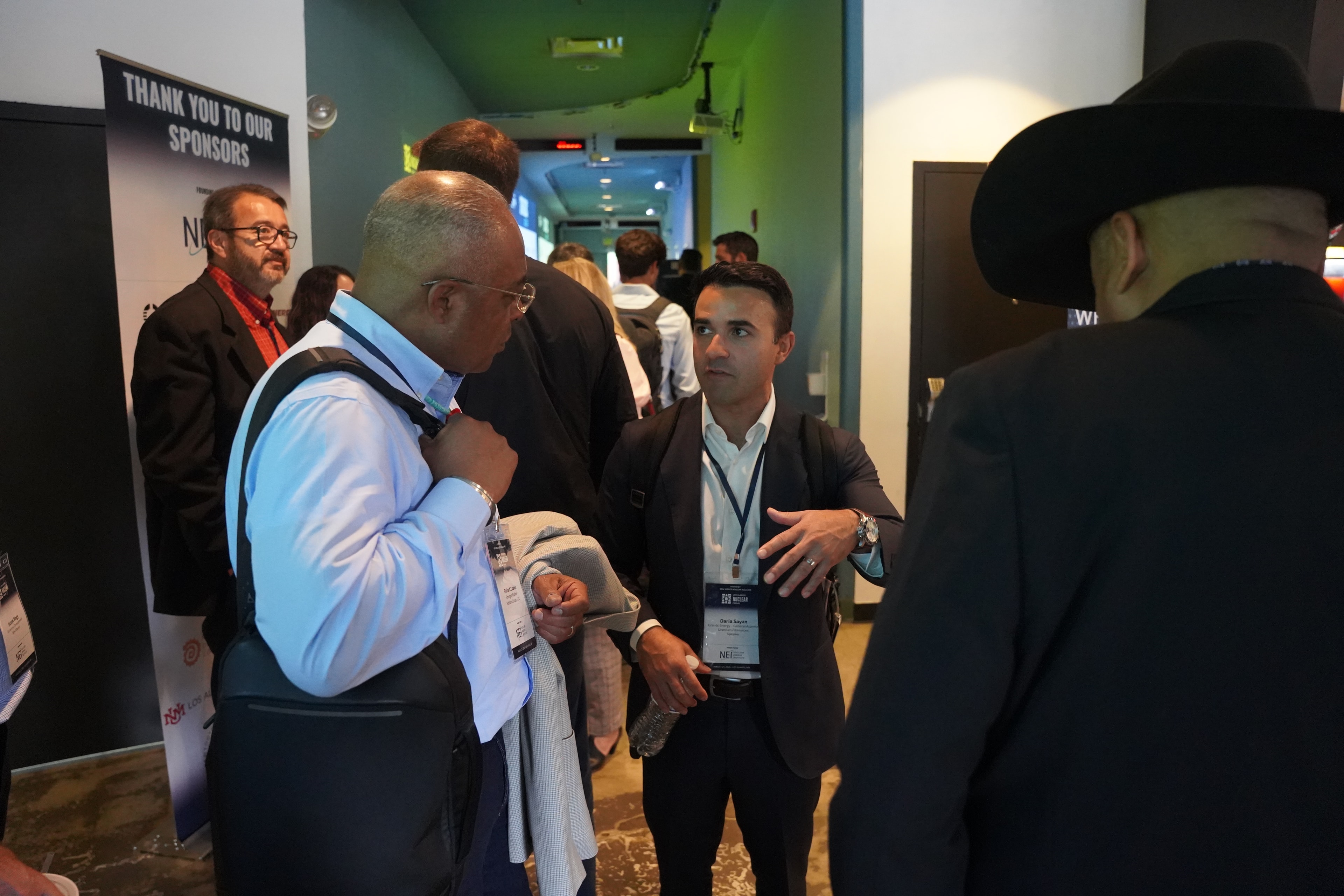 Attendees networking at the forum