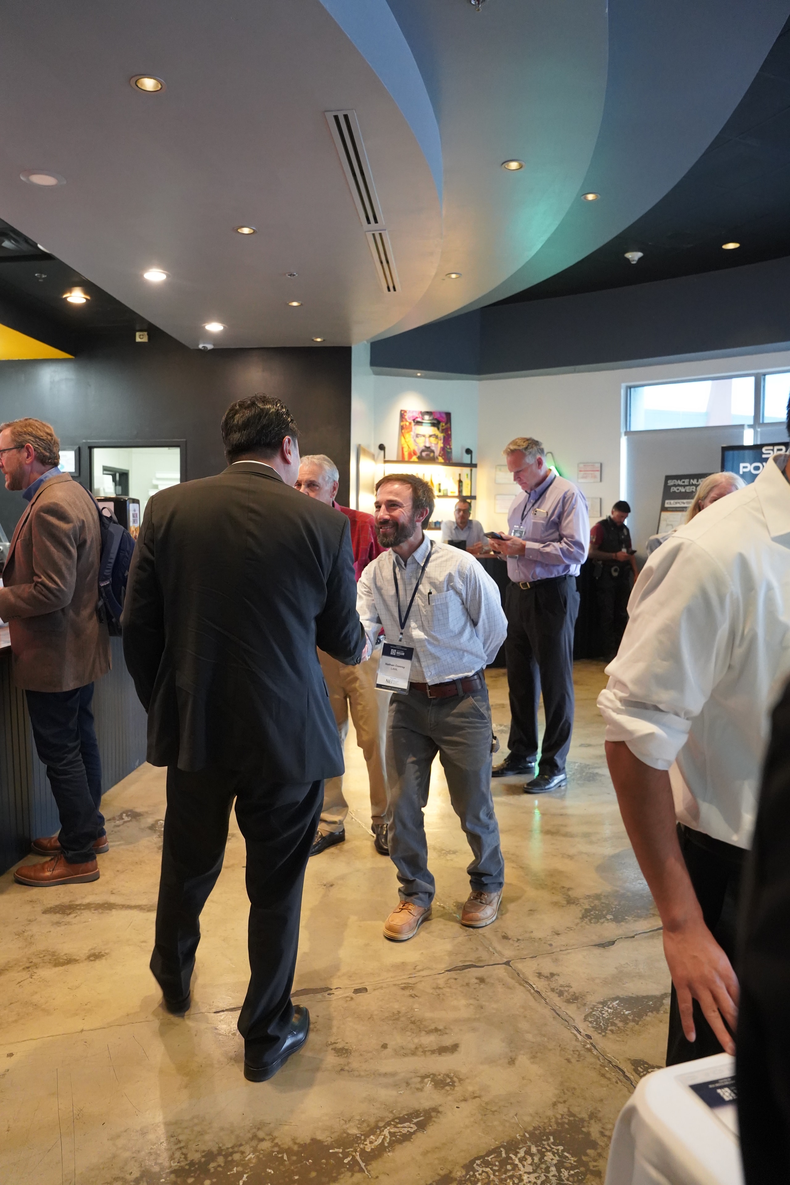 Forum attendees gathering in the venue