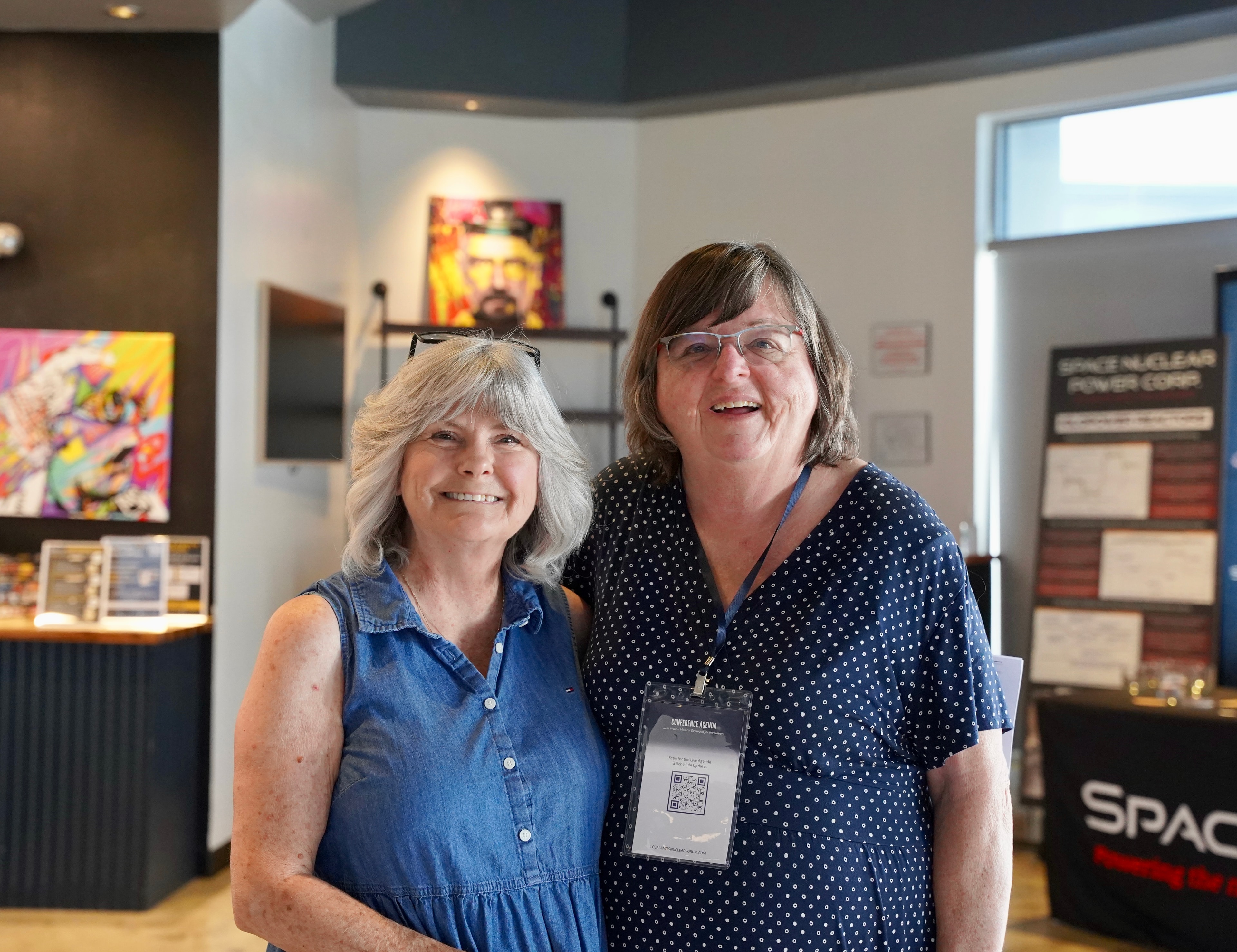 Two attendees at the forum venue